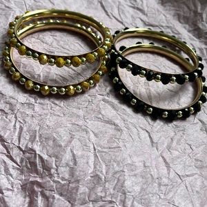 Black and gold tone bracelets And mustard yellow and gold bracelets